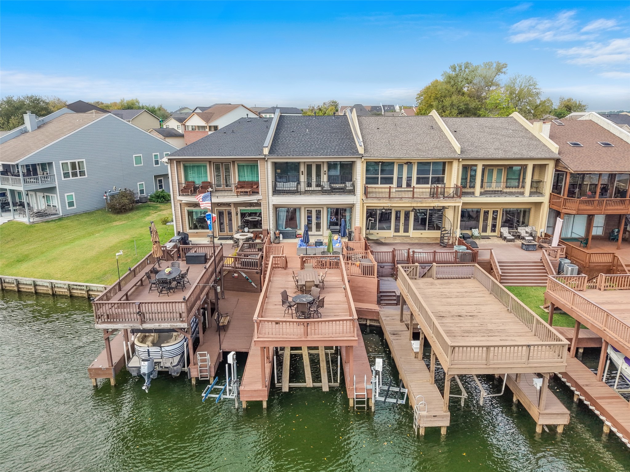 255 Capetown Way Conroe, TX 77356 - Photo 30 of 30 a aerial view of a residential apartment building with a yard