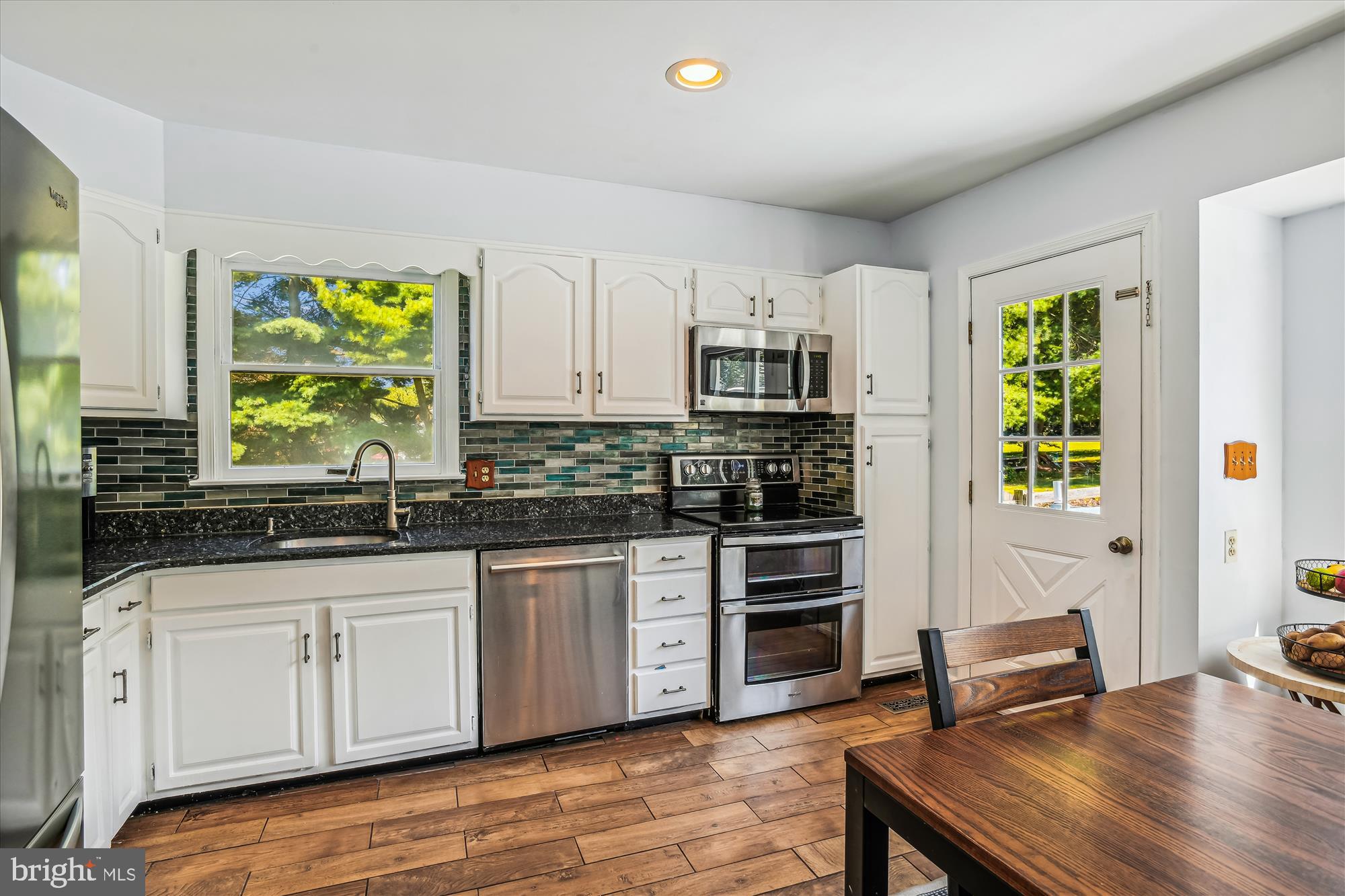 2433 Snydersburg Road Westminster, MD 21157 - Photo 2 of 51 Updated kitchen with wood floor