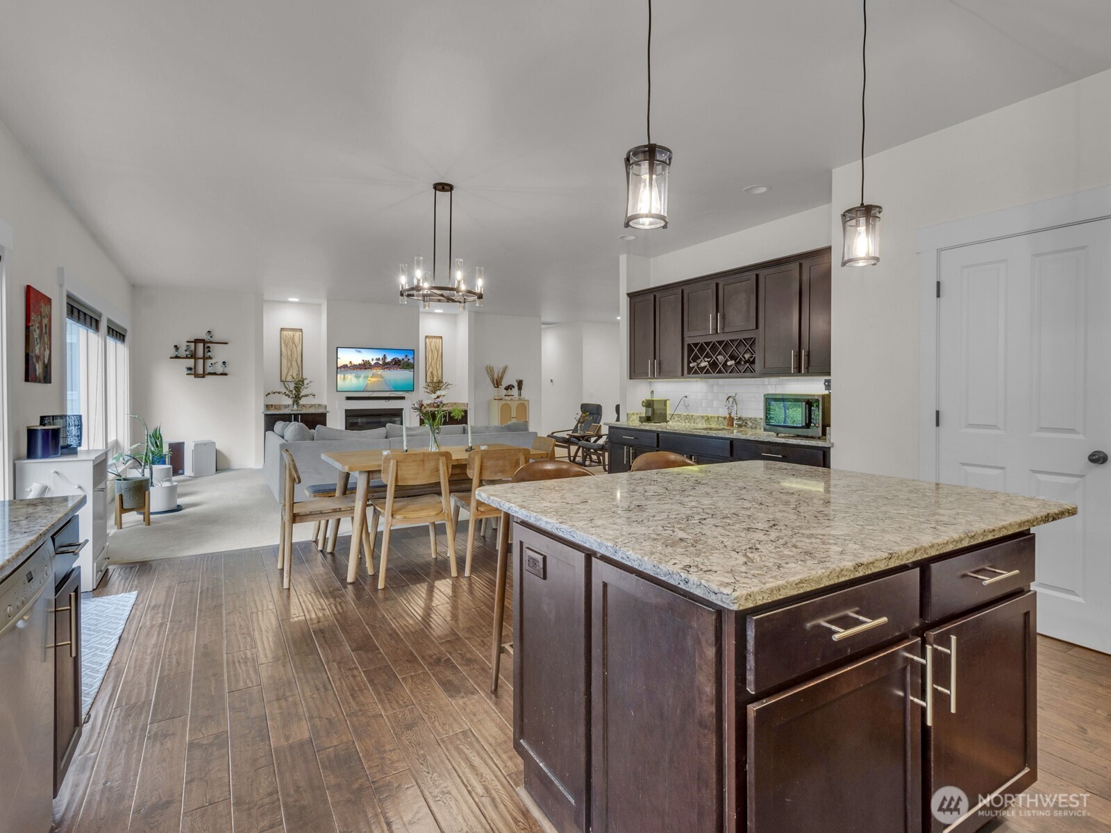 12503 Southeast 104th Street Renton, WA 98056 - Photo 17 of 37 a kitchen with a table and chairs in it