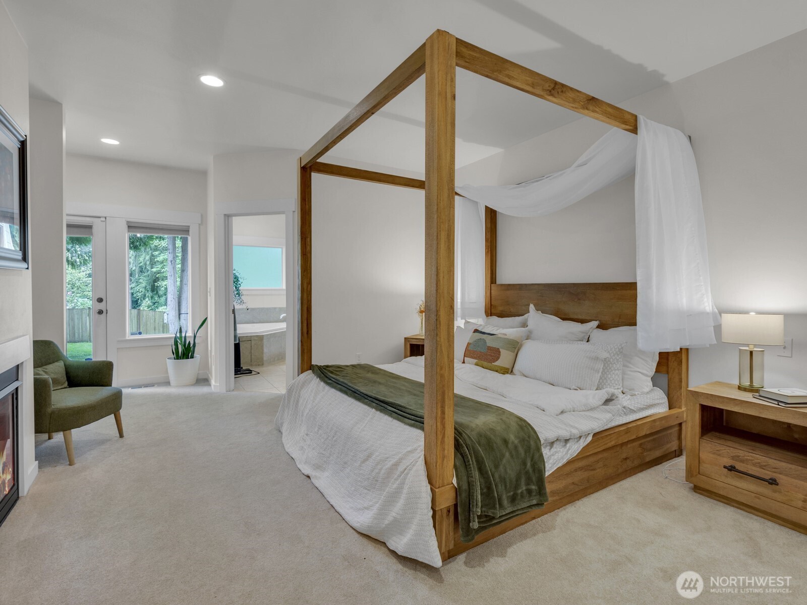 12503 Southeast 104th Street Renton, WA 98056 - Photo 18 of 37 a bedroom with a bed and a couch