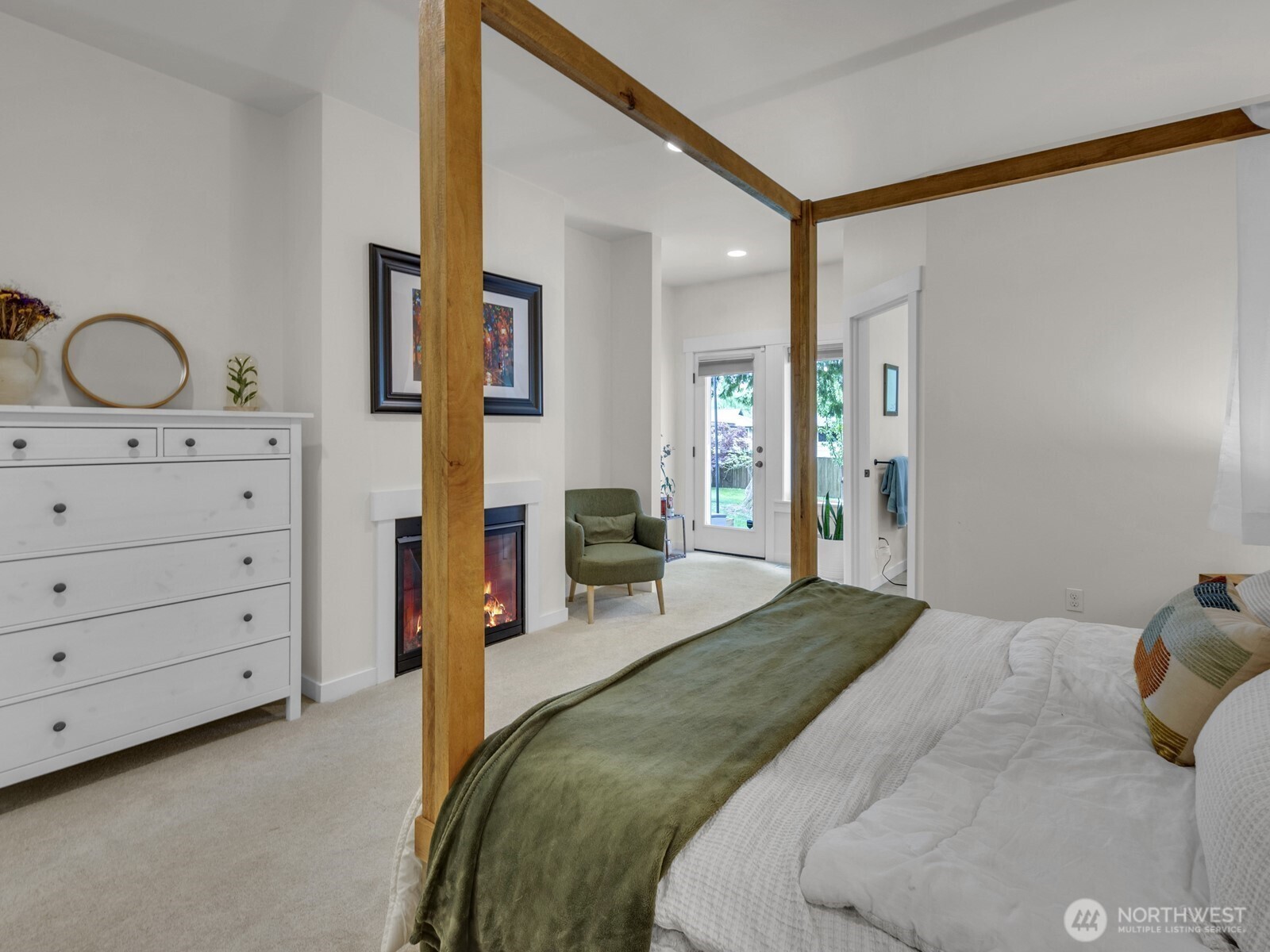 12503 Southeast 104th Street Renton, WA 98056 - Photo 19 of 37 a bedroom with a bed and large mirror