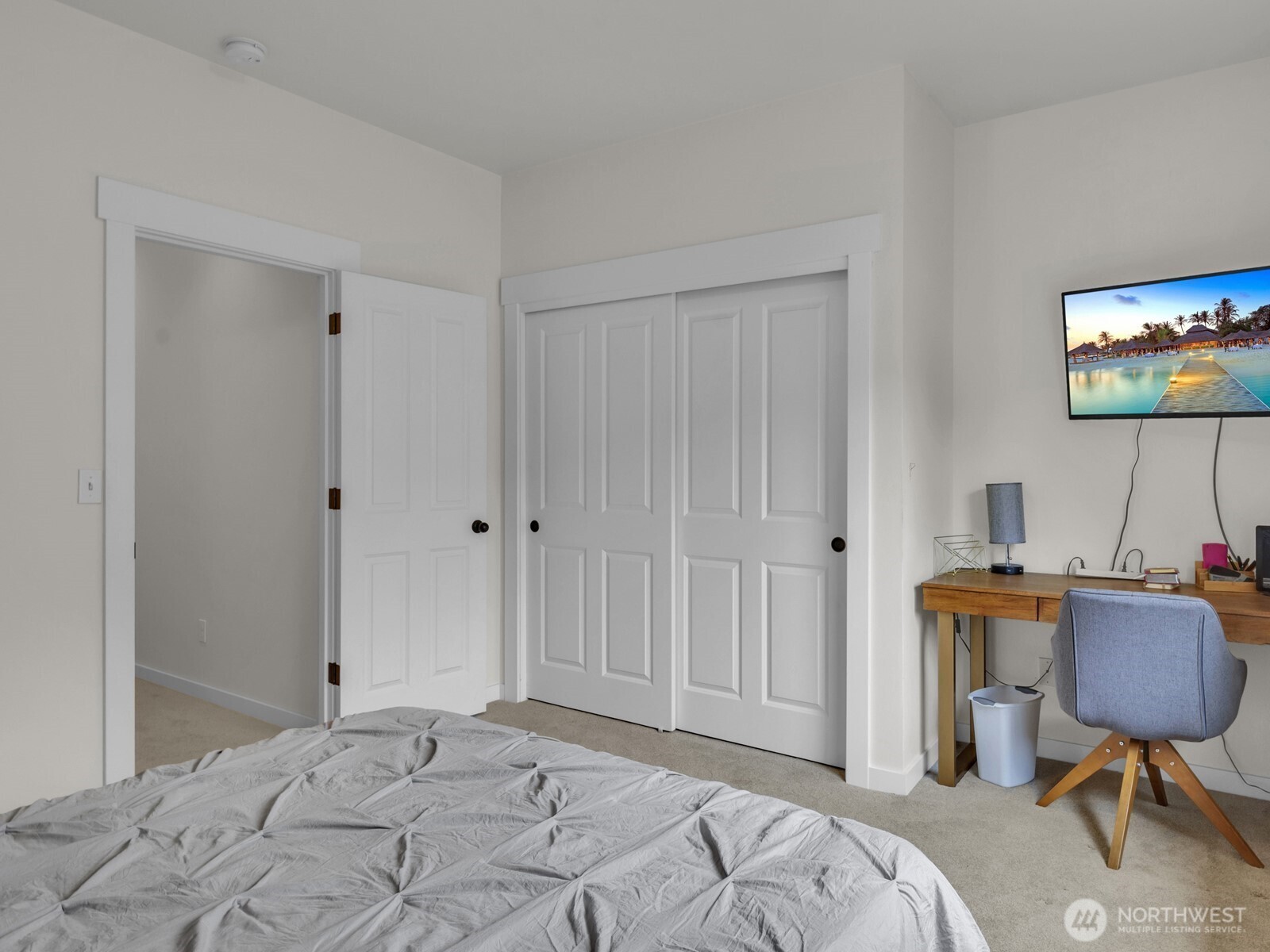 12503 Southeast 104th Street Renton, WA 98056 - Photo 26 of 37 a bedroom with a bed and a chair