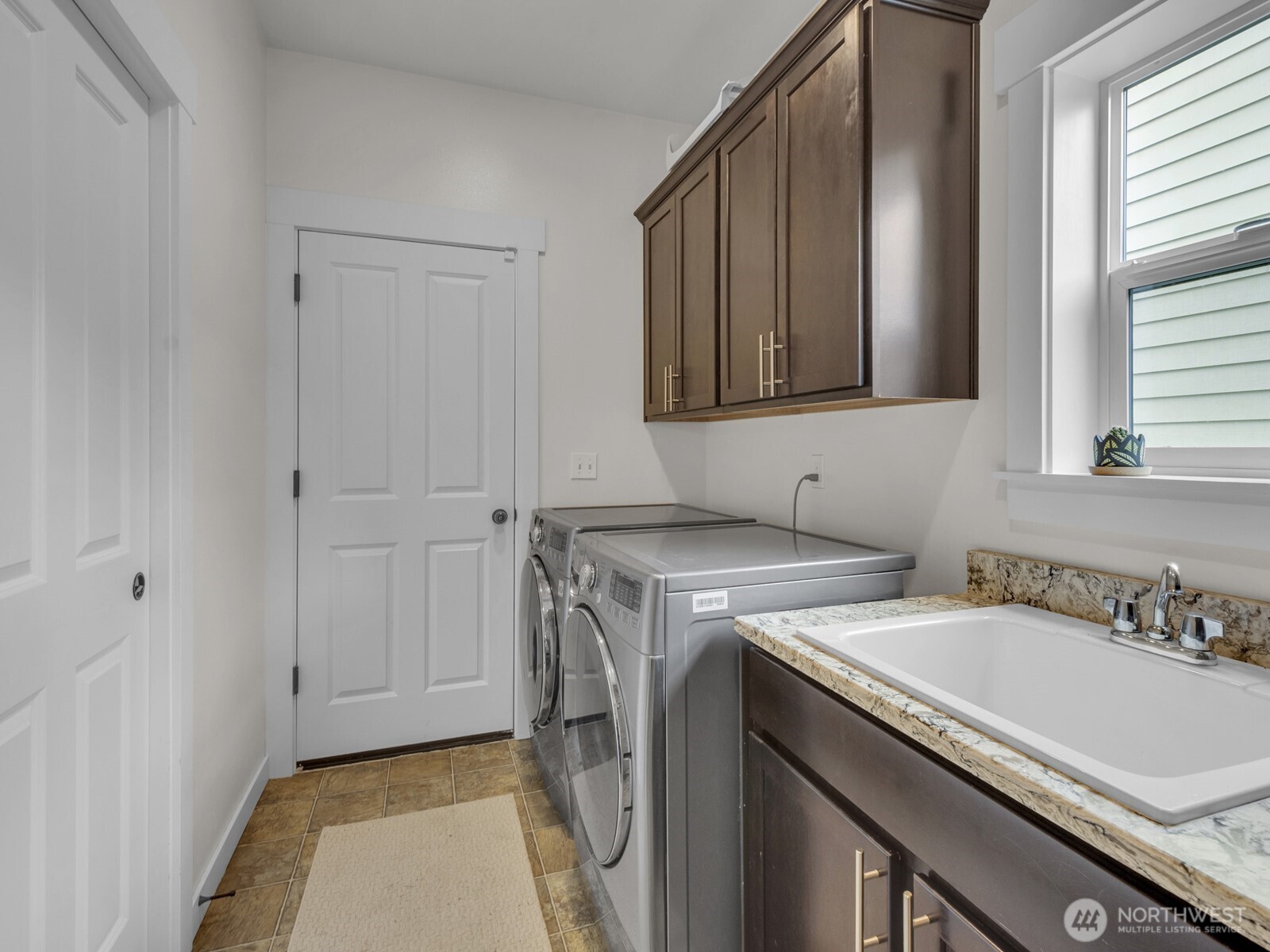 12503 Southeast 104th Street Renton, WA 98056 - Photo 30 of 37 a utility room with dryer and washer