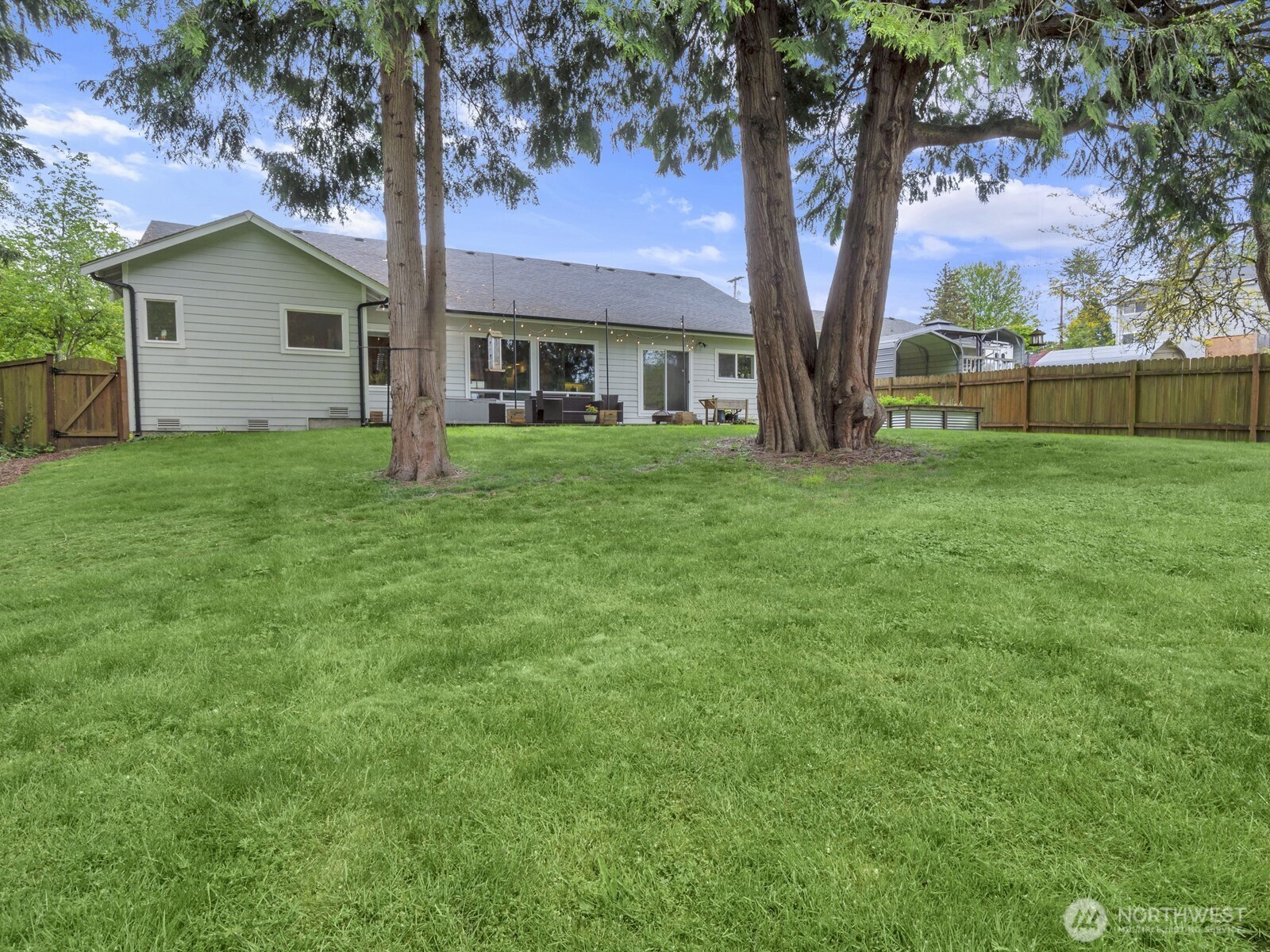 12503 Southeast 104th Street Renton, WA 98056 - Photo 34 of 37 a front view of house with yard and green space