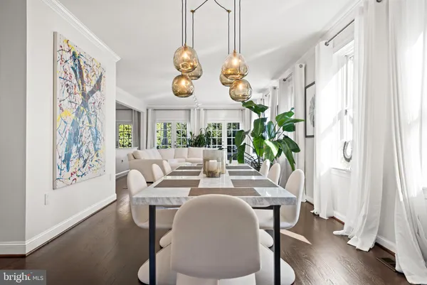 a kitchen with kitchen island granite countertop a stove a sink and a refrigerator