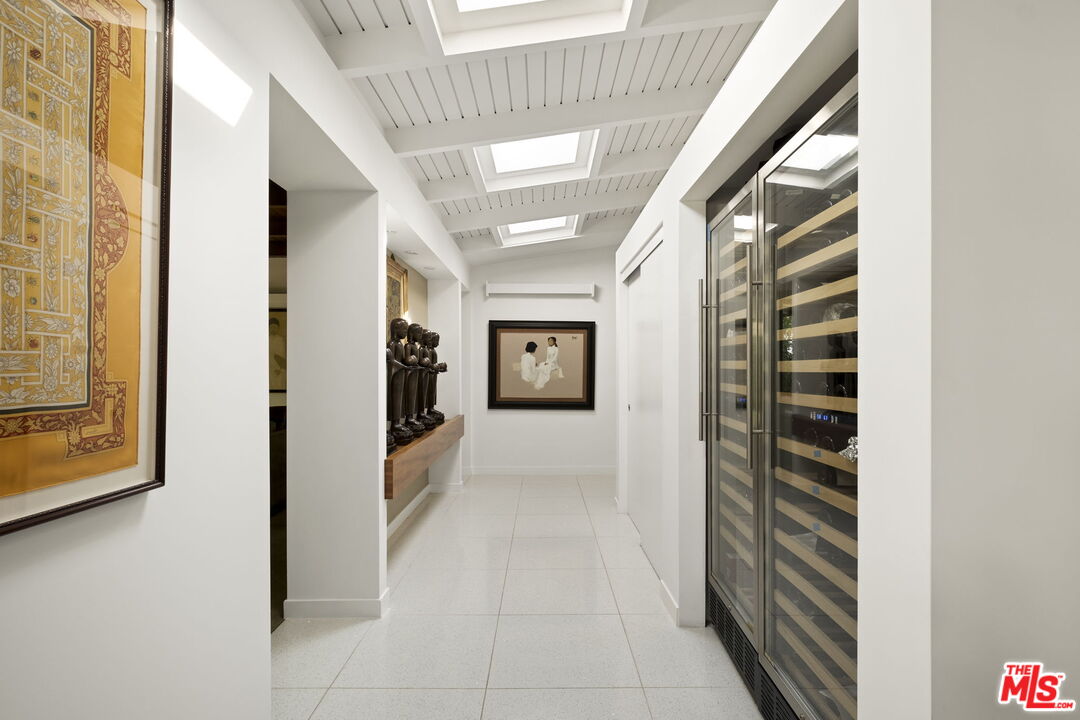 1161 Romney Drive Pasadena, CA 91105 - Photo 12 of 29 a view of hallway with stairs and wooden floor