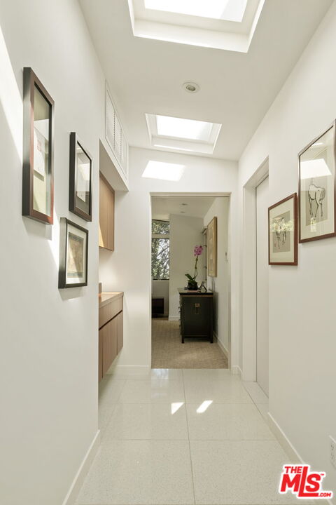 1161 Romney Drive Pasadena, CA 91105 - Photo 13 of 29 a view of a hallway to a livingroom with furniture