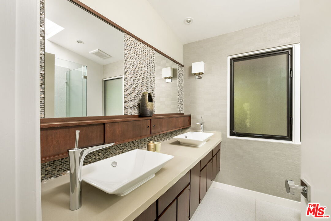 1161 Romney Drive Pasadena, CA 91105 - Photo 23 of 29 a bathroom with a sink and a mirror