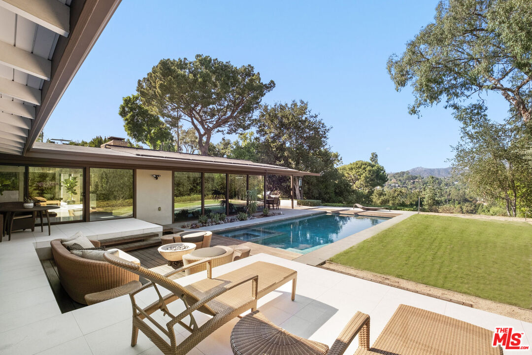 1161 Romney Drive Pasadena, CA 91105 - Photo 27 of 29 a view of a patio with swimming pool table and chairs