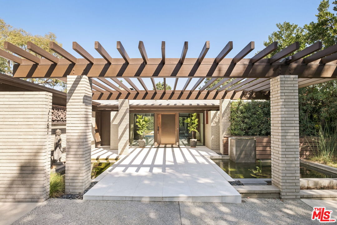 1161 Romney Drive Pasadena, CA 91105 - Photo 3 of 29 a view of a backyard with a patio