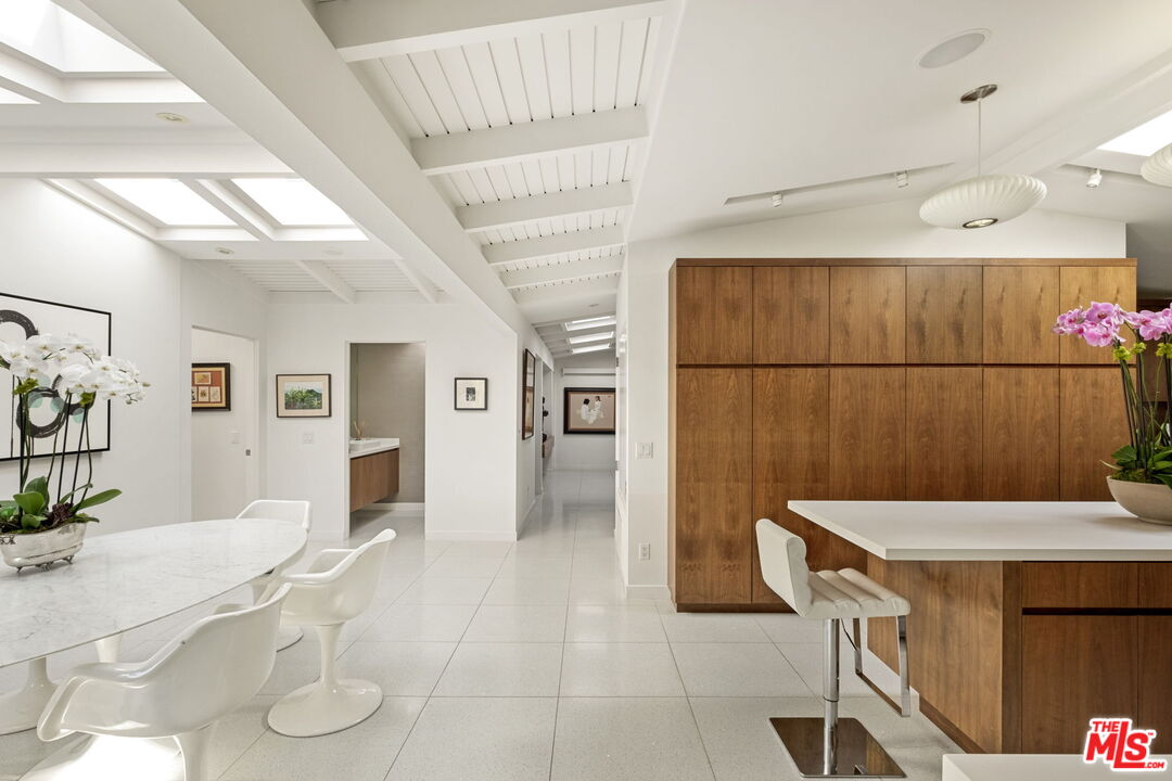 1161 Romney Drive Pasadena, CA 91105 - Photo 6 of 29 a room with table and chairs