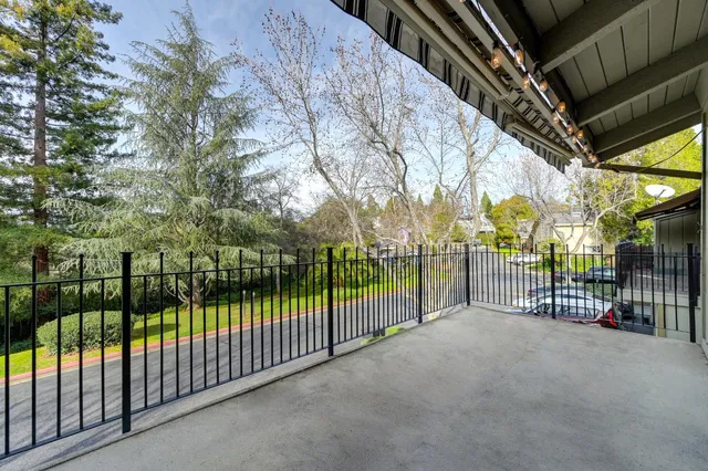 a view of a hallway view with staircase