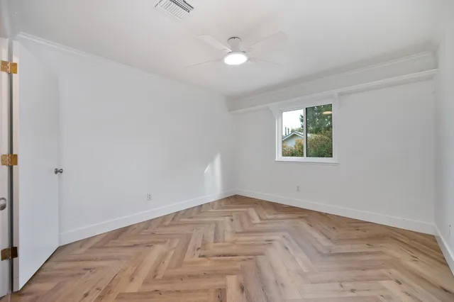a bathroom with a sink a vanity and a mirror