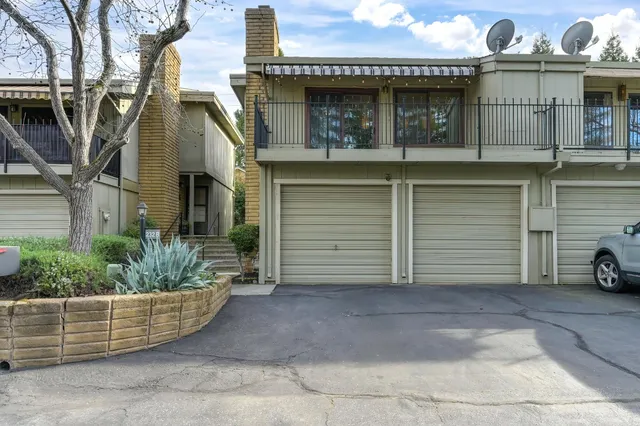 a view of a house with a garage