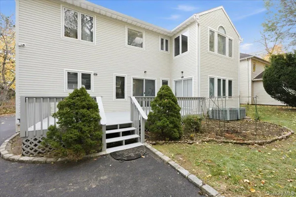 a house view with a garden space