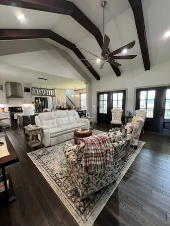 a bed room with furniture window and wooden floor