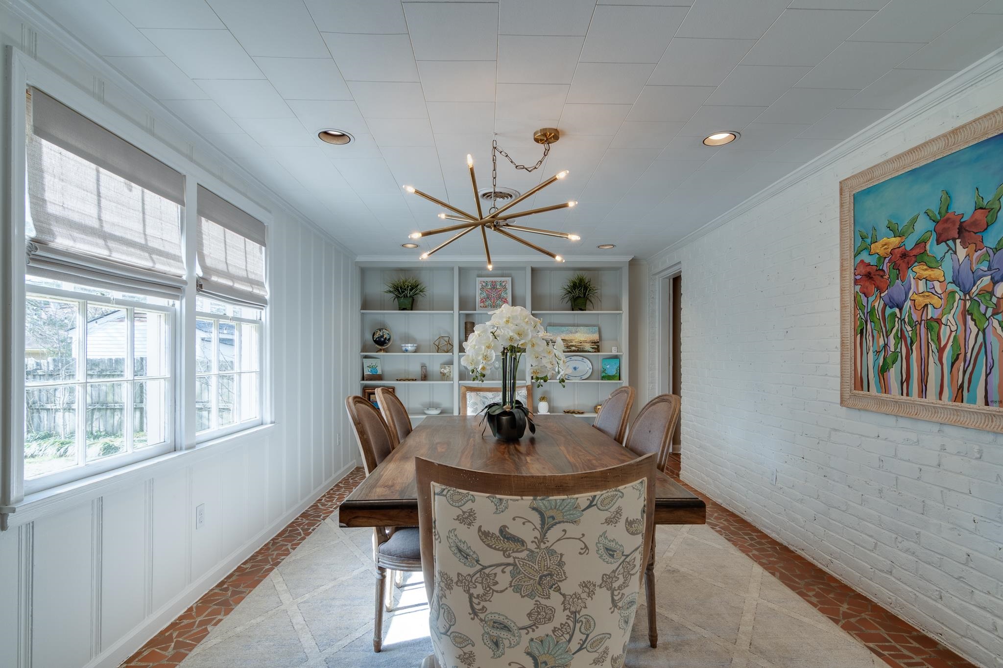 337 North White Station Road Memphis, TN 38117 - Photo 13 of 37 Dining area featuring brick wall, ornamental molding, built in shelves, a notable chandelier, and recessed lighting