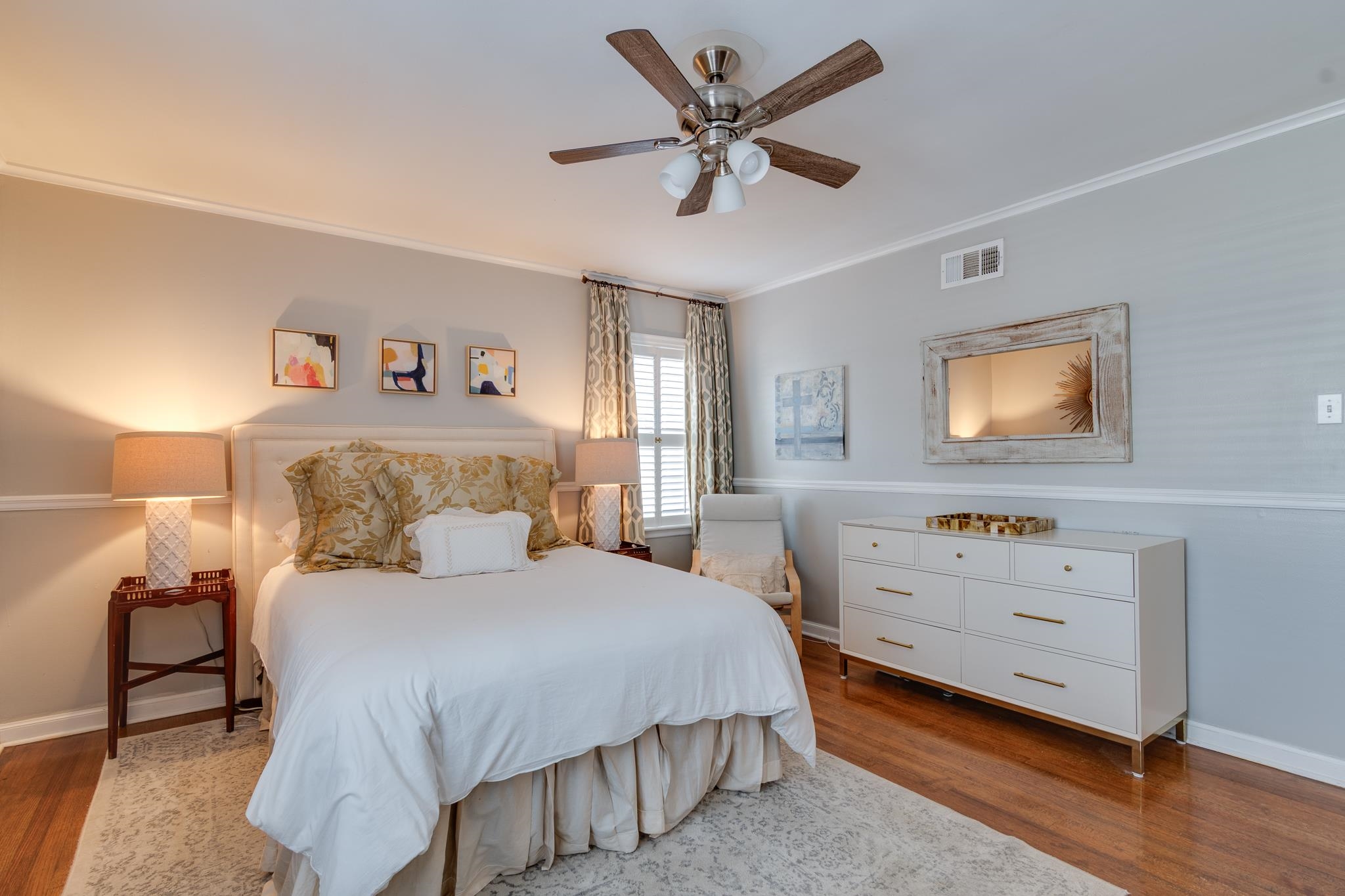337 North White Station Road Memphis, TN 38117 - Photo 26 of 37 Bedroom with wood finished floors, a ceiling fan, visible vents, baseboards, and ornamental molding