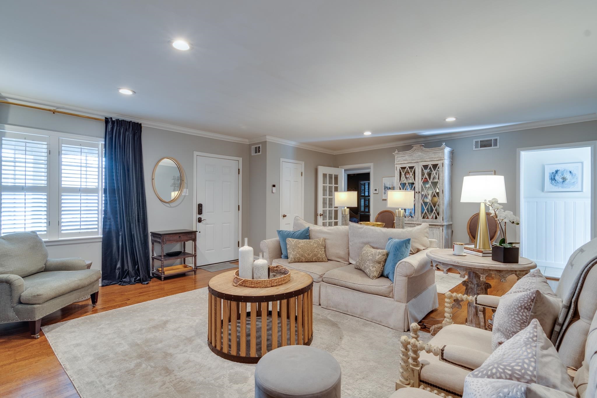 337 North White Station Road Memphis, TN 38117 - Photo 5 of 37 Living room featuring light wood finished floors, recessed lighting, visible vents, and ornamental molding