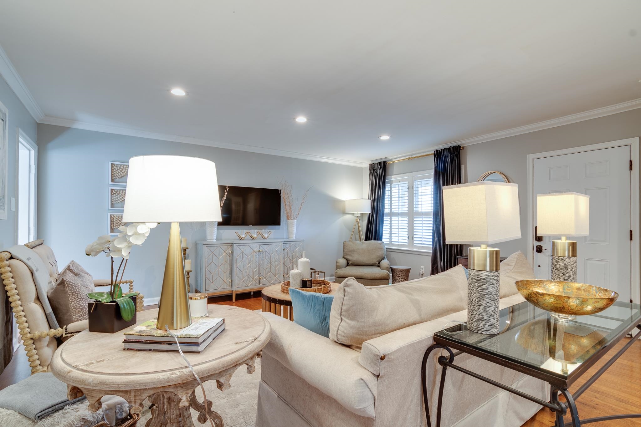 337 North White Station Road Memphis, TN 38117 - Photo 6 of 37 Living room featuring recessed lighting, wood finished floors, and crown molding