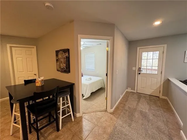 a workspace with furniture and window