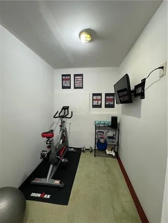 a view of a room with gym equipment