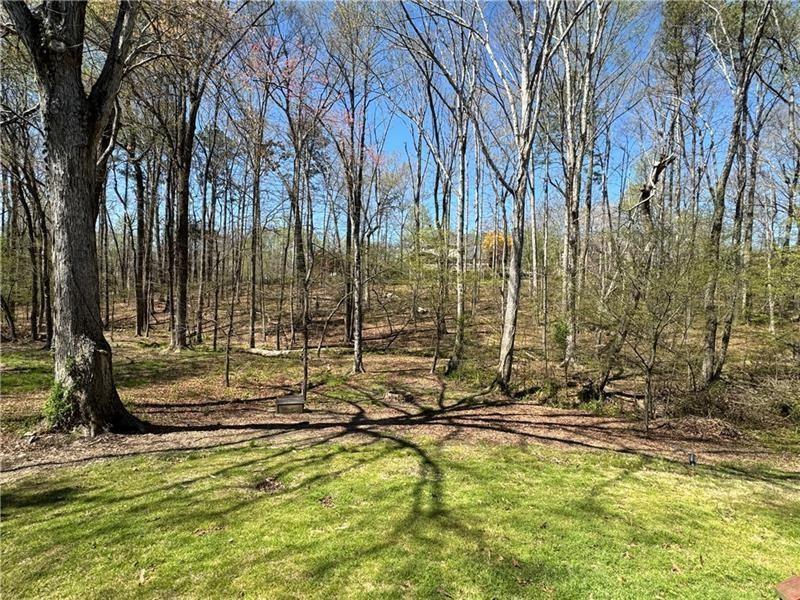 415 Holland Springs Drive Northwest, Unit TERRAC Powder Springs, GA 30127 - Photo 22 of 24 a view of swimming pool with outdoor seating
