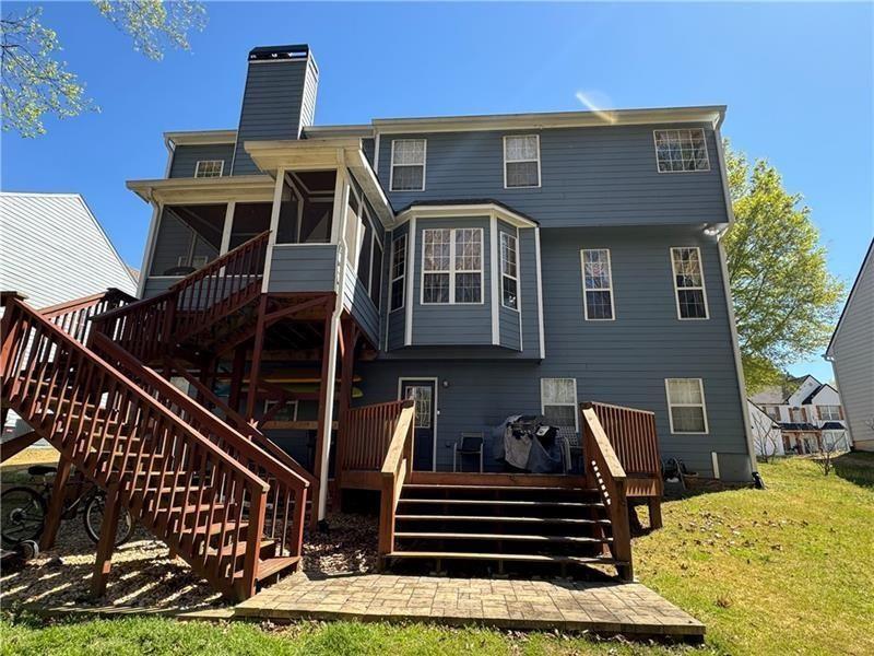 415 Holland Springs Drive Northwest, Unit TERRAC Powder Springs, GA 30127 - Photo 24 of 24 a front view of a house with a yard