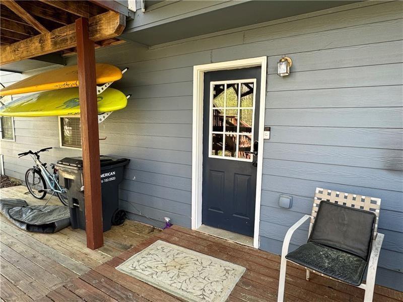 415 Holland Springs Drive Northwest, Unit TERRAC Powder Springs, GA 30127 - Photo 5 of 24 a view of a door and chair