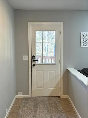 an empty room with windows