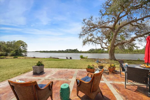 a view of a lake with outdoor space
