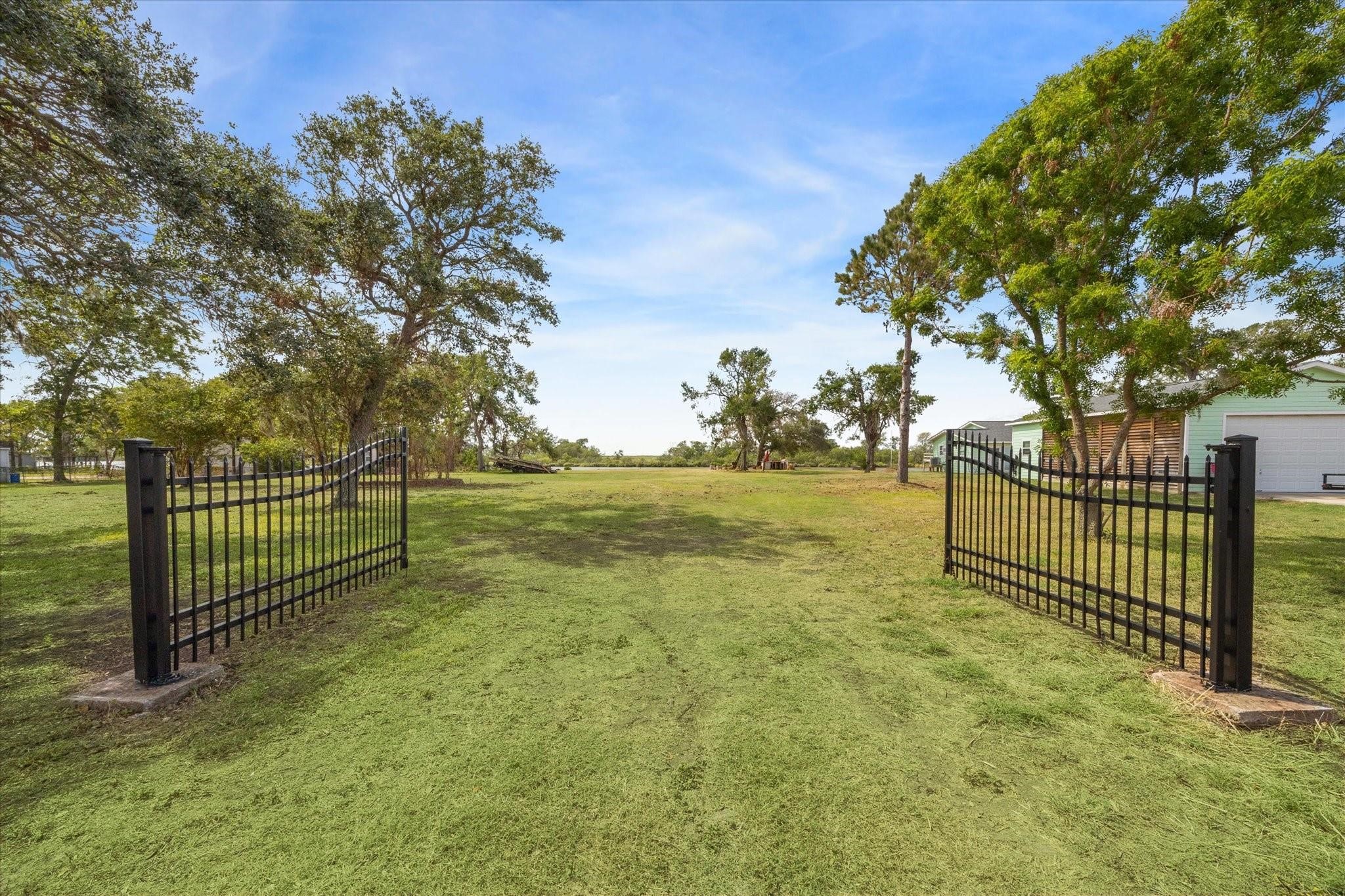 246 County Road 206 Sargent, TX 77414 - Photo 7 of 10 a view of a fence and trees