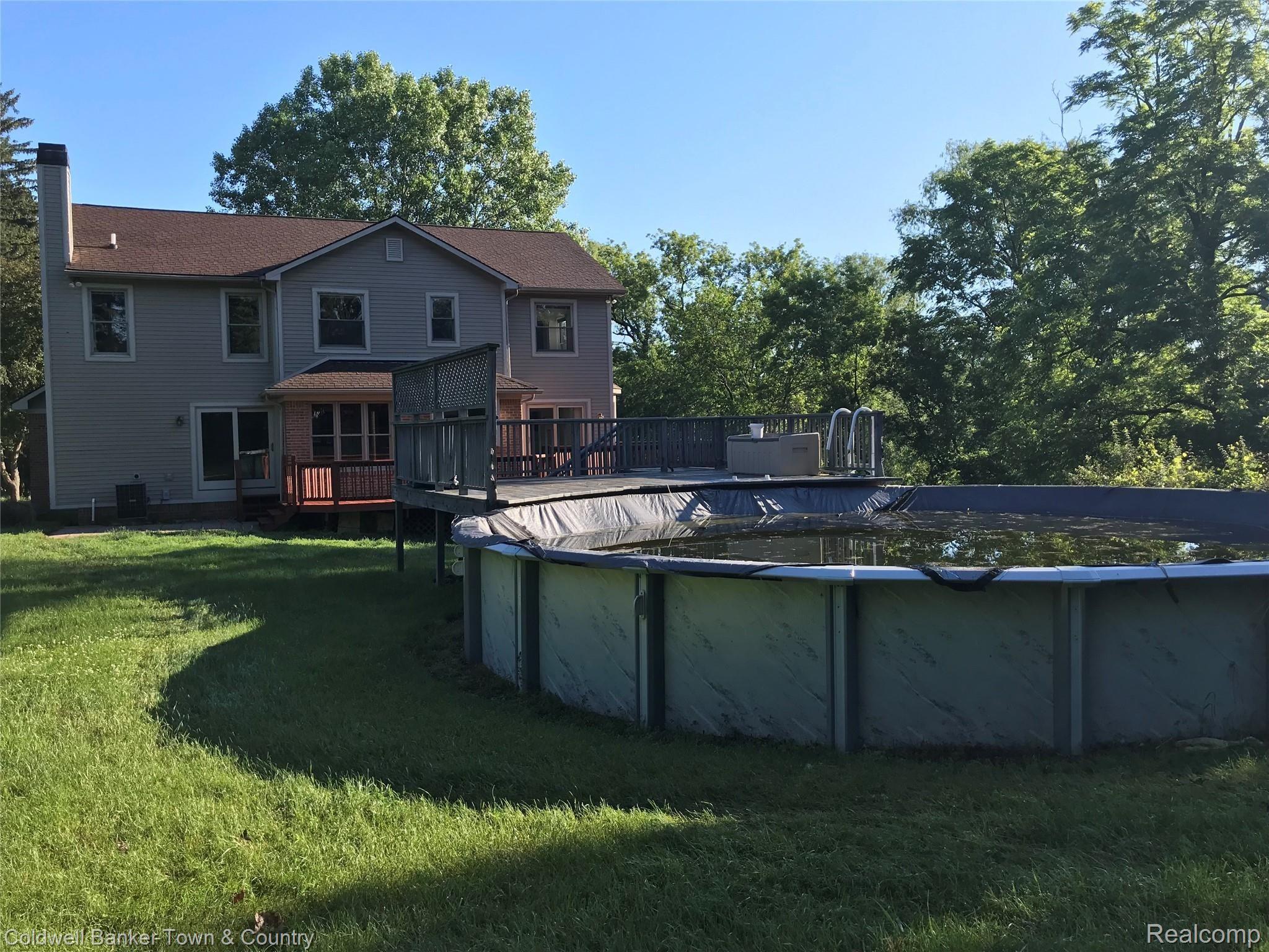 4400 Brighton Road Howell, MI 48843 - Photo 4 of 22 Pool and Sundeck