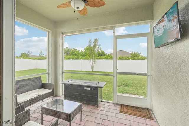 a view of a room with a large window