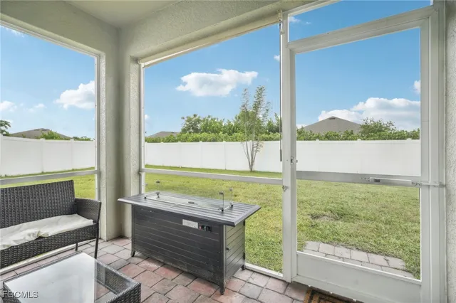 a living room with a couch and a table