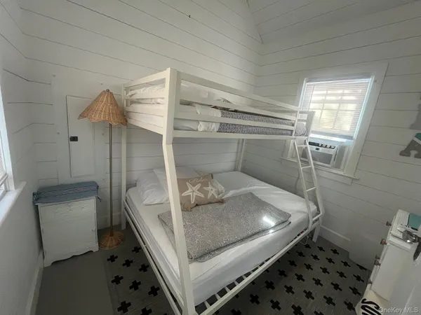 a bathroom with a sink and toilet