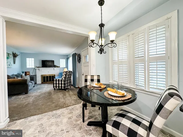 a view of a livingroom and dining room
