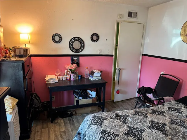 a bathroom with a toilet a sink and a shower