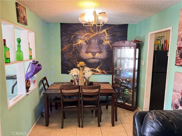 a kitchen with stainless steel appliances a sink stove and cabinets