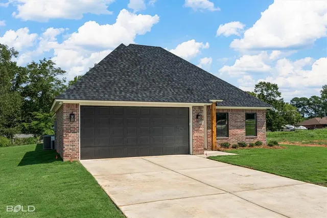 a front view of house with yard