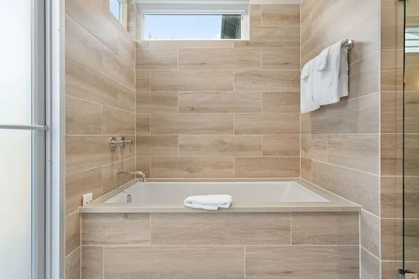 a bathroom with a bathtub