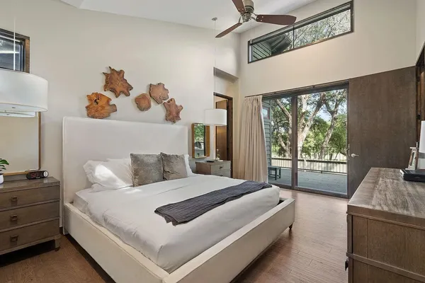 a bed room with a bed and a window