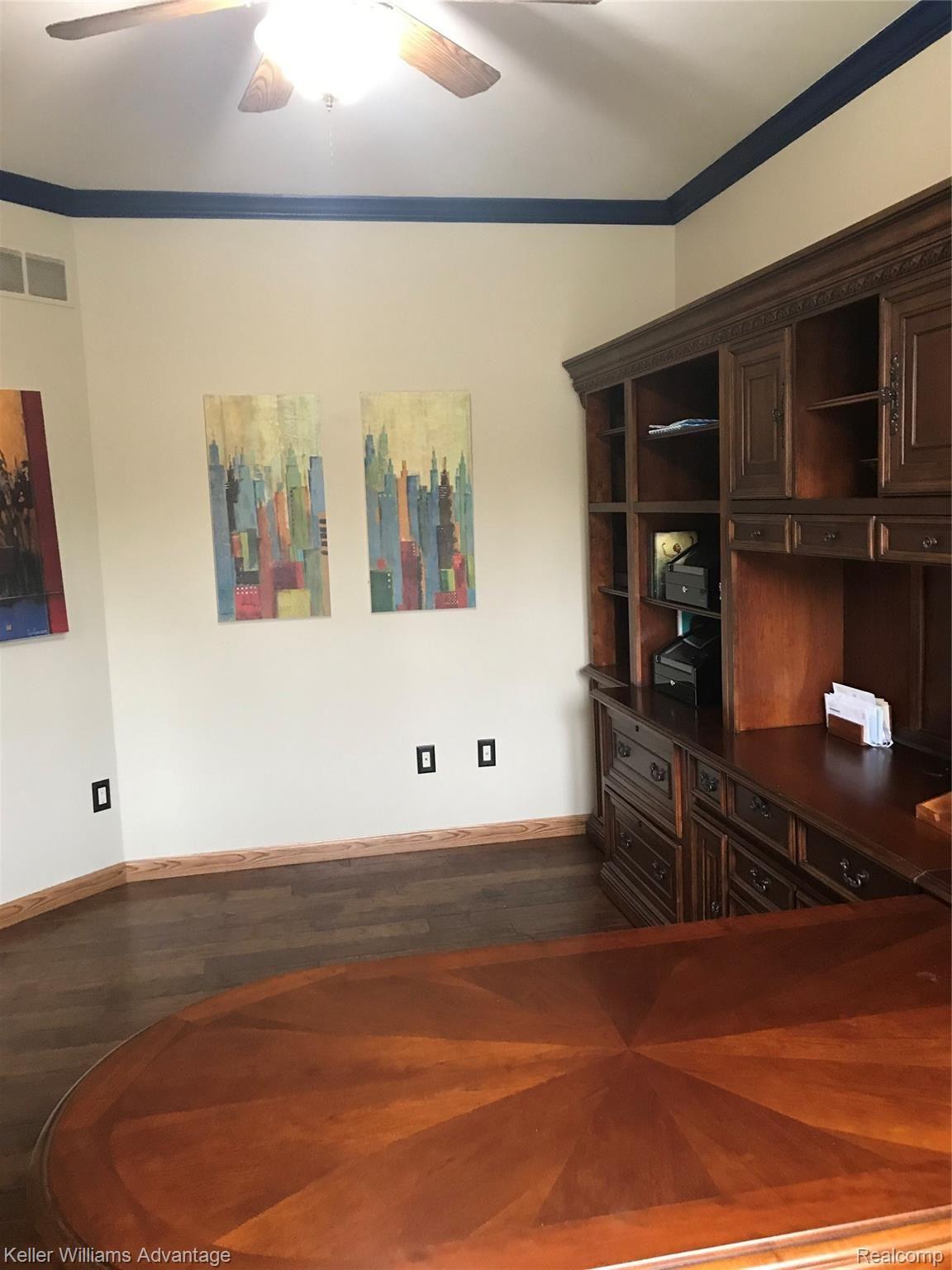 47719 Pavillon Road Canton, MI 48188 - Photo 11 of 50 Library with hardwood floor, french doors and high end desk and components that remain.