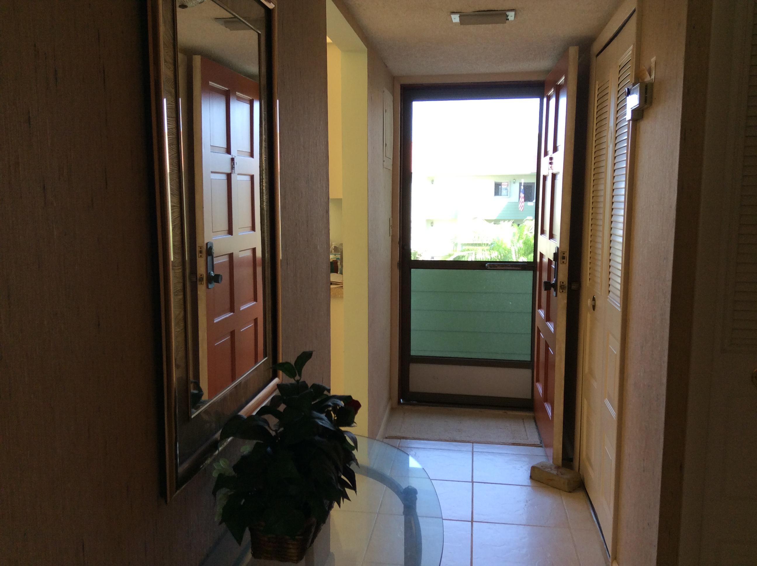 5433 Southeast Miles Grant Road, Unit E201 Stuart, FL 34997 - Photo 10 of 14 IMG_1003