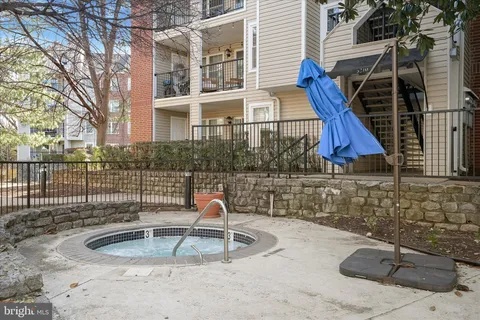 a view of a patio with wooden floor