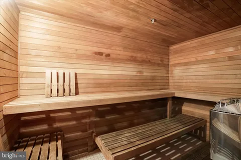 a view of a chair and tables in the yard