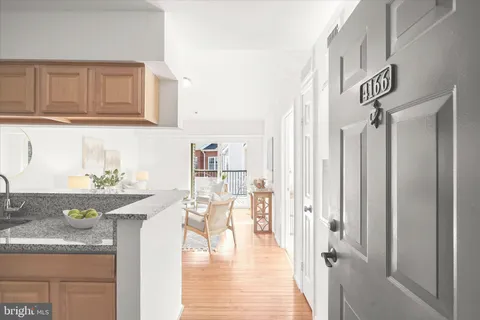 a view of a kitchen with appliances and cabinets