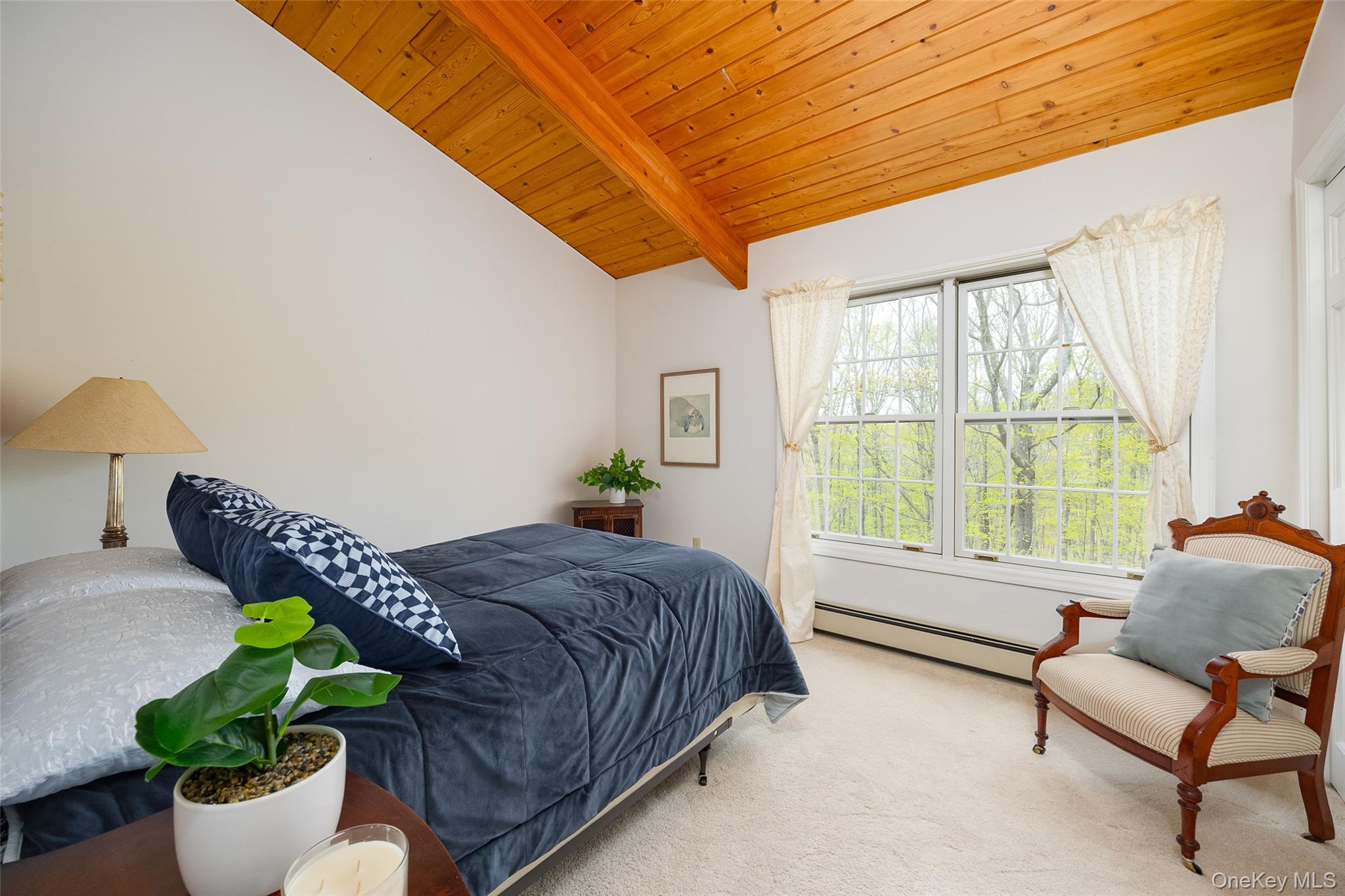 33 Willow Brook Ridge Clinton Corners, NY 12514 - Photo 37 of 50 a spacious bedroom with a bed and a window