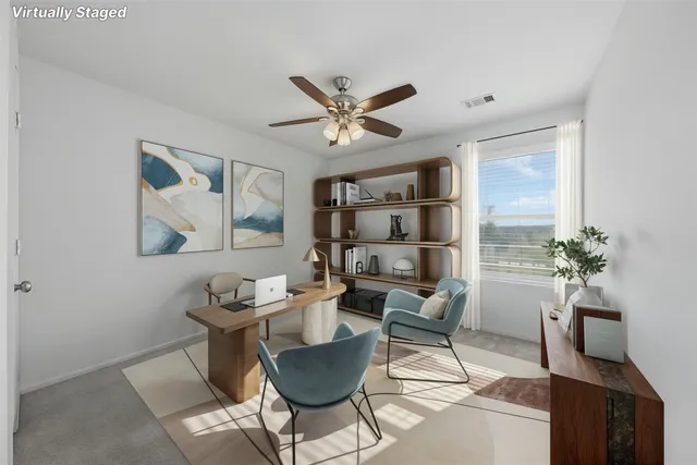 a bedroom with bed and wooden floor