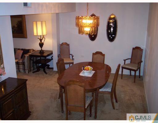 8006 Hana Road Edison, NJ 08817 - Photo 3 of 9 a dining room with furniture and window